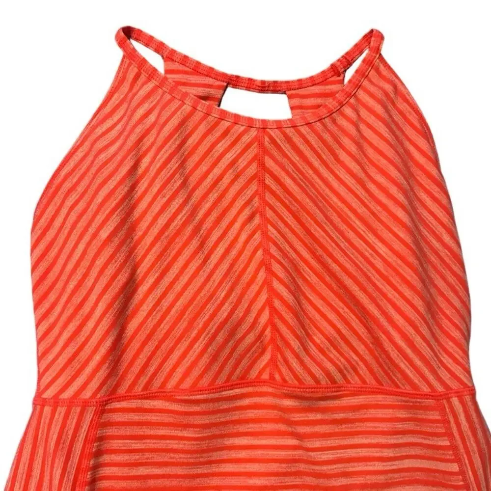 Title nine vibrant coral